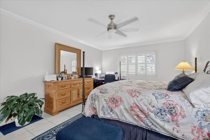 This spacious 2/2 ground-floor condo offers the perfect blend of - photo 17