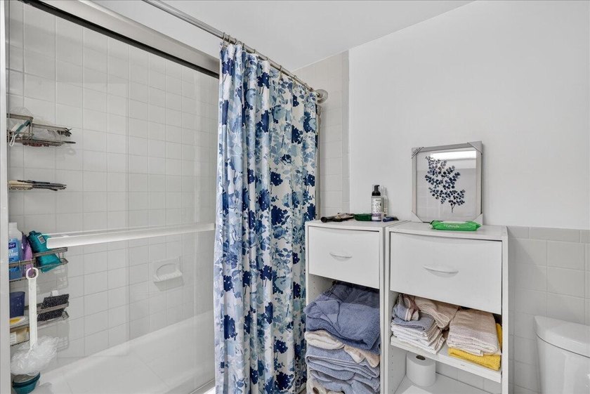 This spacious 2/2 ground-floor condo offers the perfect blend of - photo 19