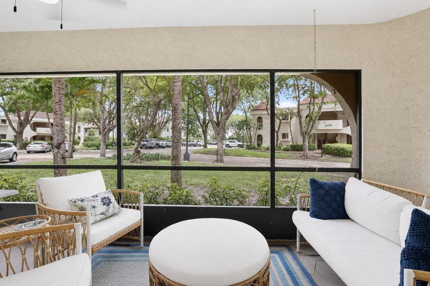 This spacious 2/2 ground-floor condo offers the perfect blend of - photo 21