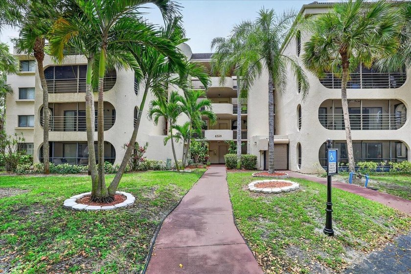 This spacious 2/2 ground-floor condo offers the perfect blend of - photo 23