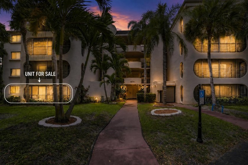 This spacious 2/2 ground-floor condo offers the perfect blend of - photo 26