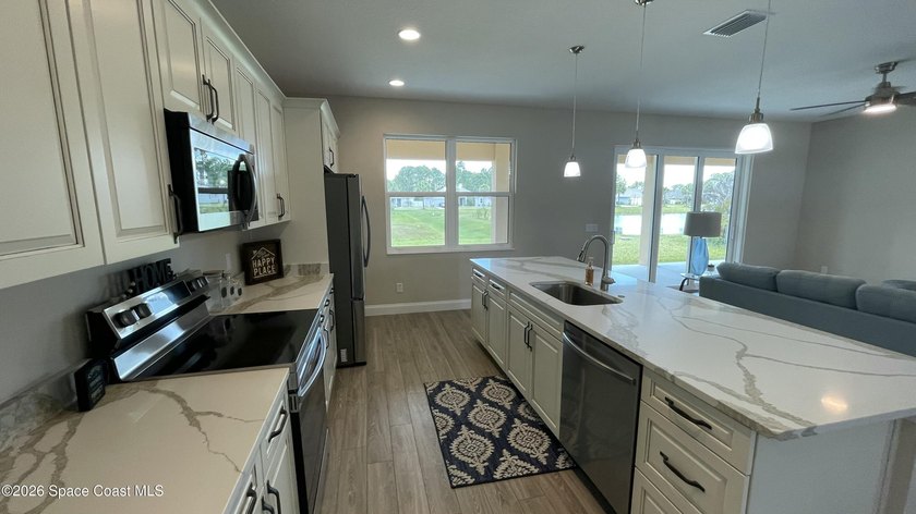 Experience effortless Florida living in this brand-new, move-in - photo 50