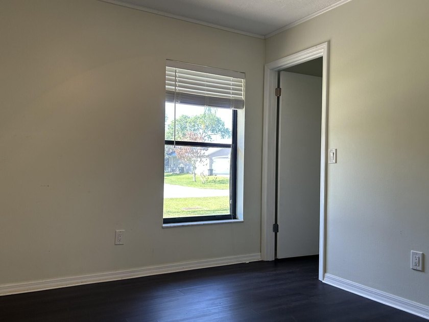 Discover this solid 2-bedroom, 2-bath CBS home with a 1-car - photo 11