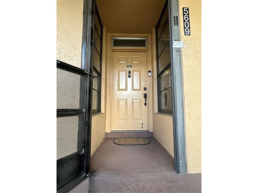 Discover this delightful first-floor unit in the sought-after - photo 4