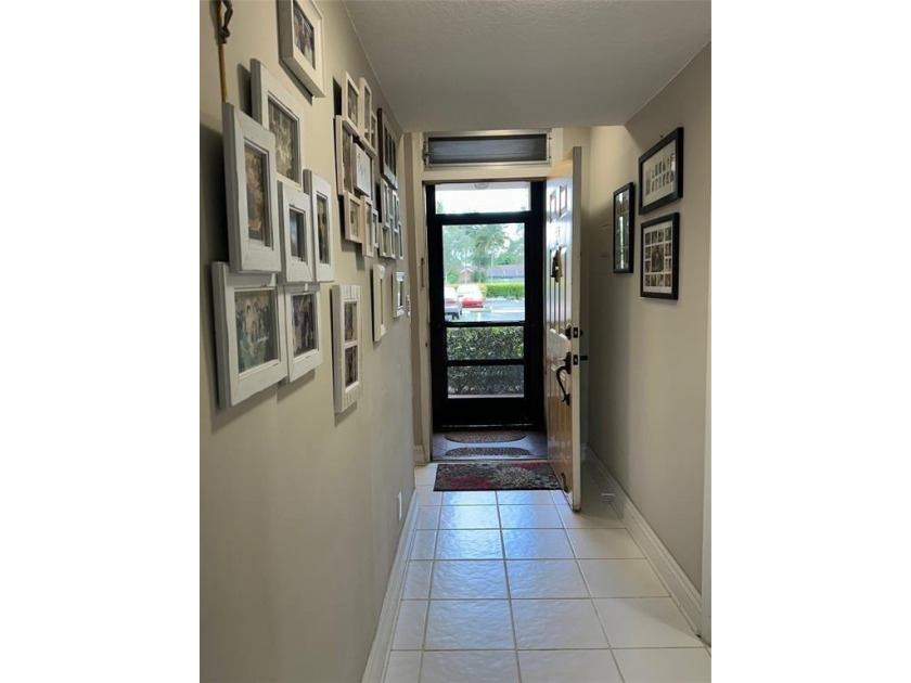 Discover this delightful first-floor unit in the sought-after - photo 5