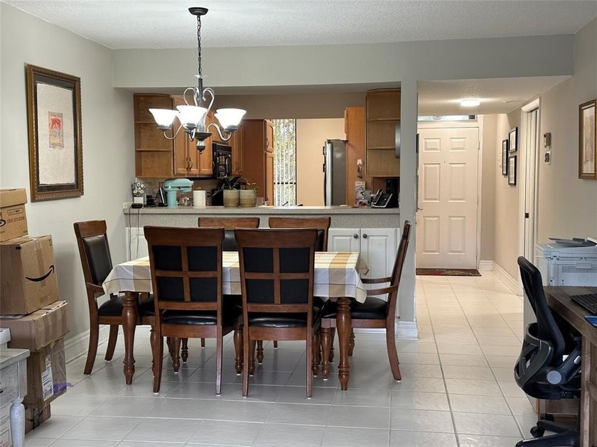 Discover this delightful first-floor unit in the sought-after - photo 7