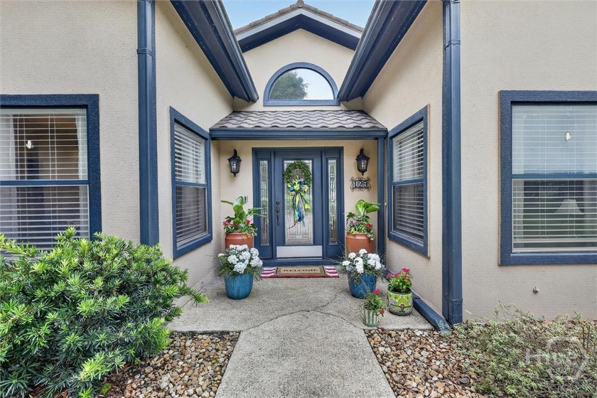 Nestled beneath 22 mature oak trees and surrounded by coastal - photo 6