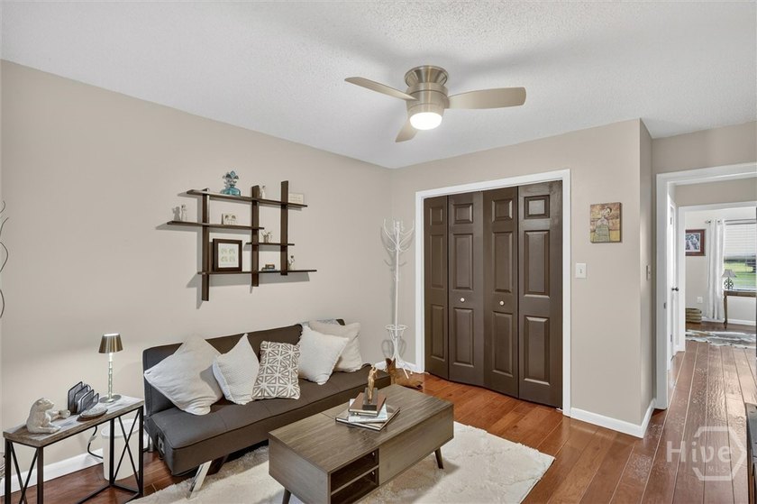 Nestled beneath 22 mature oak trees and surrounded by coastal - photo 8