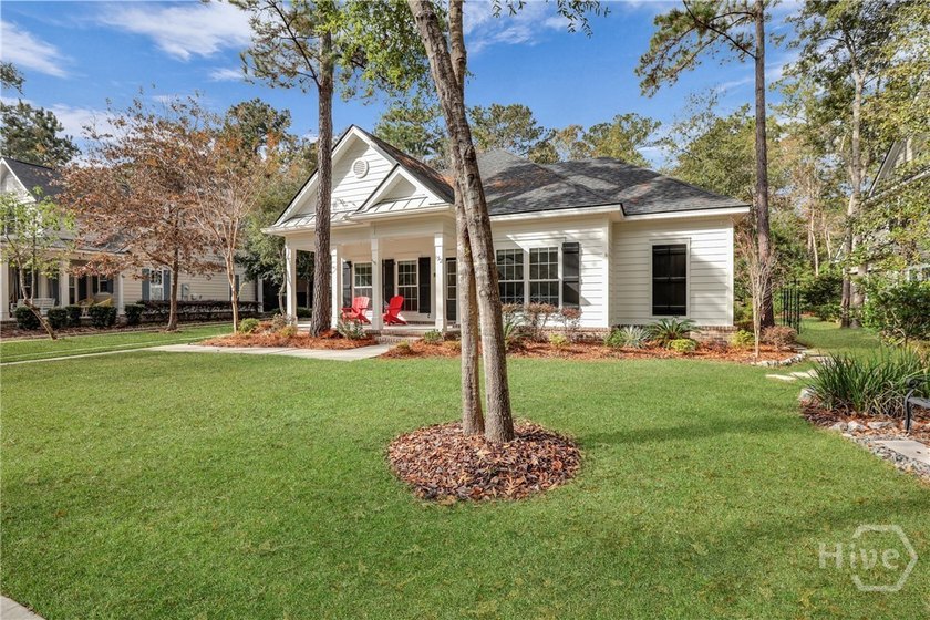 Welcome to this charming single-level Craftsman cottage in the - photo 3