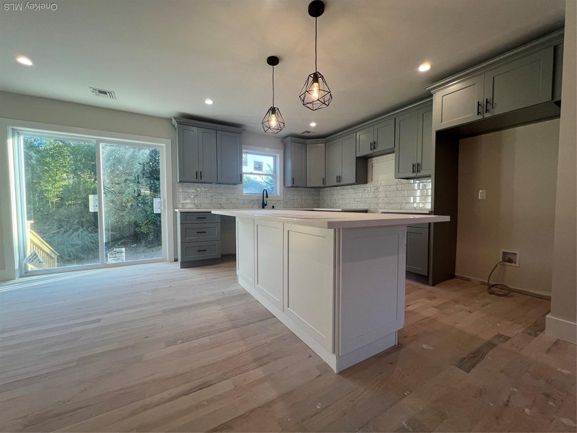 Brand-new custom Cape Cod home offering East End living with a - photo 5