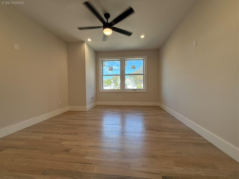 Brand-new custom Cape Cod home offering East End living with a - photo 10
