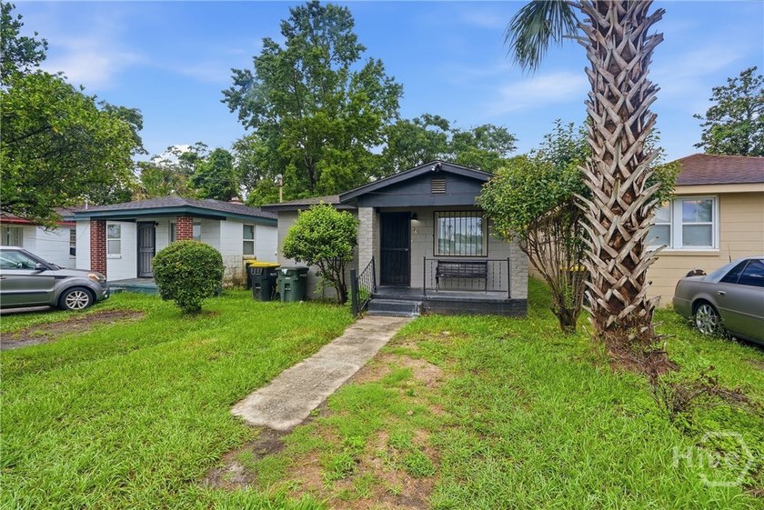This well-maintained 3-bedroom, 1-bath block home offers - photo 3
