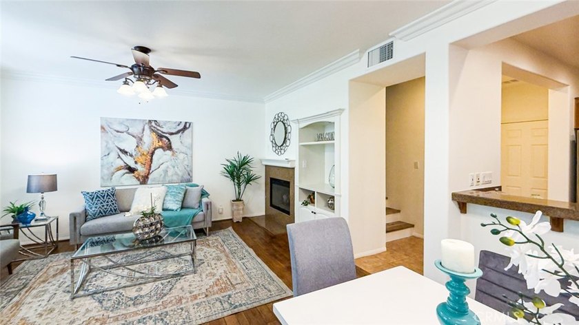RARE DUAL PRIMARY LAYOUT! Welcome to effortless luxury living in - photo 2