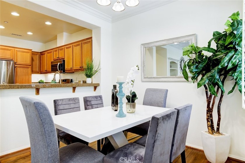 RARE DUAL PRIMARY LAYOUT! Welcome to effortless luxury living in - photo 6