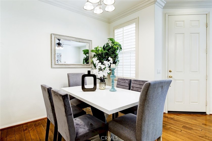 RARE DUAL PRIMARY LAYOUT! Welcome to effortless luxury living in - photo 7