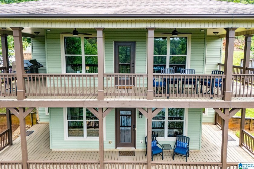 THIS LAKE FRONT HOME WITH AN OPEN FLOOR PLAN OFFERS COMFORT AND - photo 8
