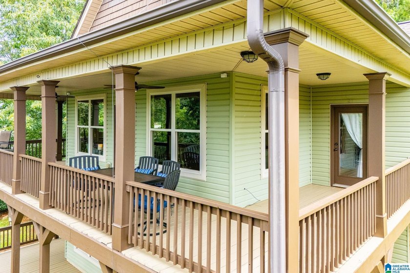 THIS LAKE FRONT HOME WITH AN OPEN FLOOR PLAN OFFERS COMFORT AND - photo 9