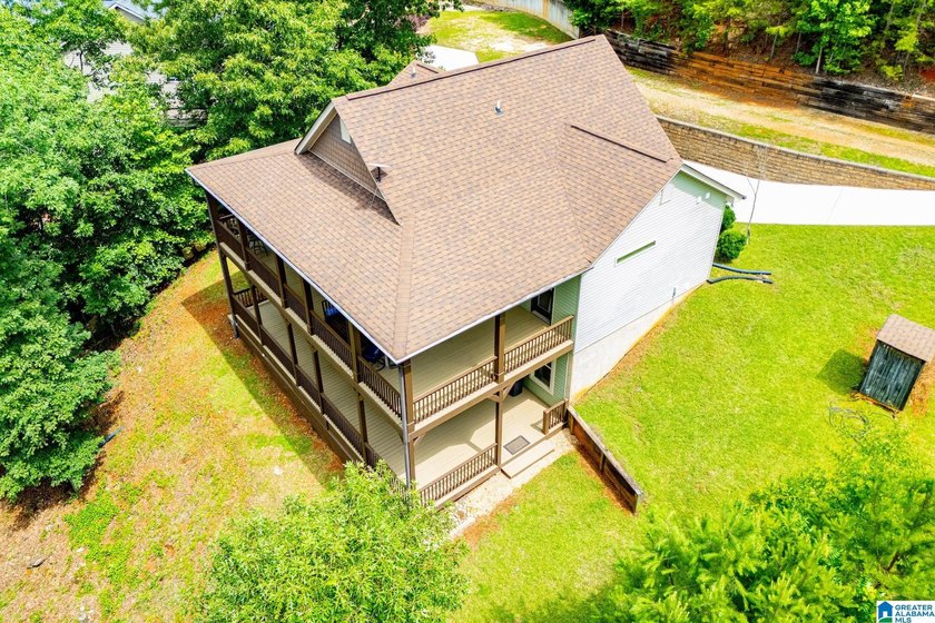 THIS LAKE FRONT HOME WITH AN OPEN FLOOR PLAN OFFERS COMFORT AND - photo 10
