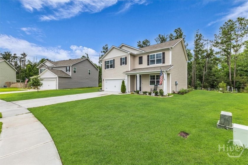 This 2-story, 5-bedroom, 3-bathroom beauty has laid all its - photo 3