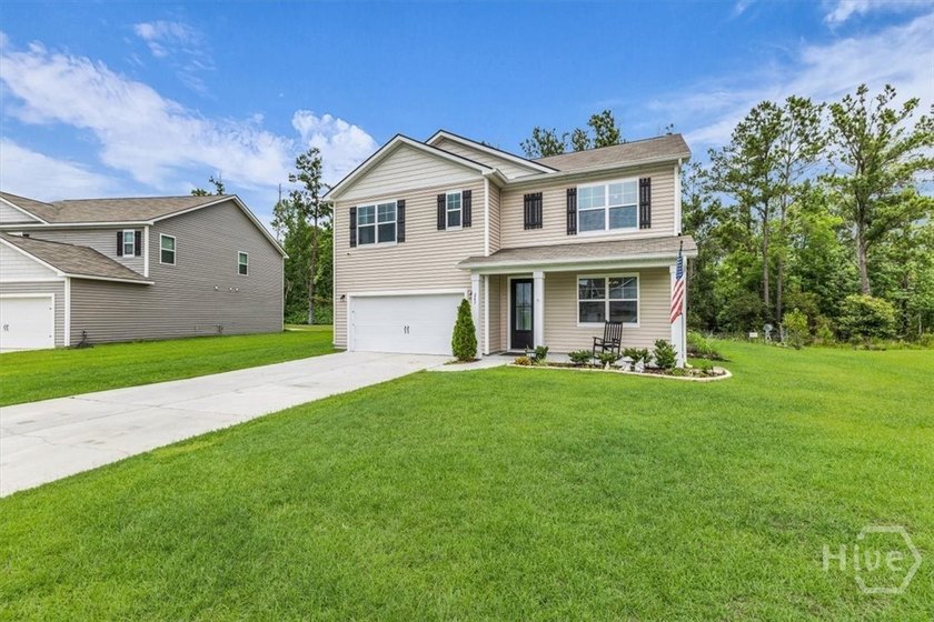 This 2-story, 5-bedroom, 3-bathroom beauty has laid all its - photo 4