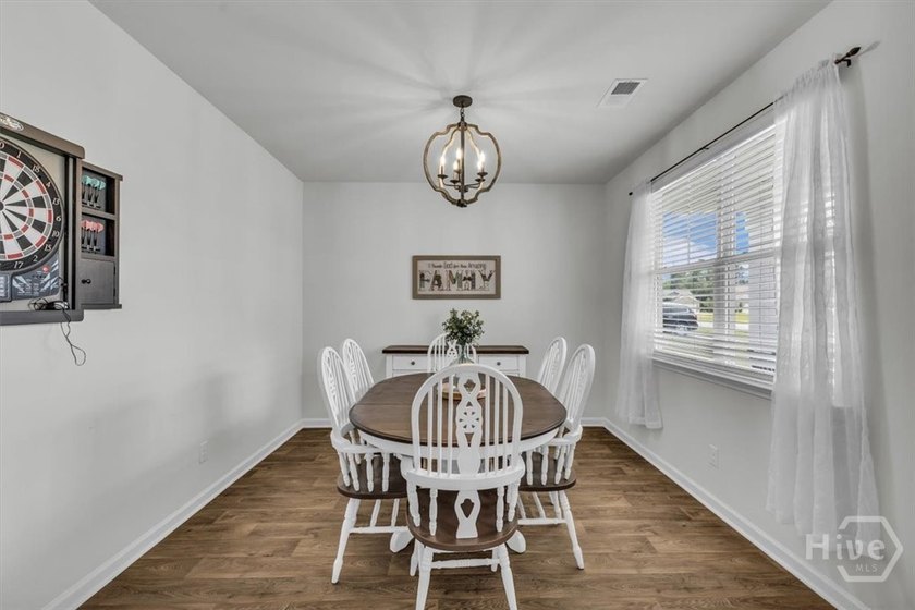 This 2-story, 5-bedroom, 3-bathroom beauty has laid all its - photo 8