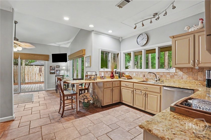 Located in the Marshwood section of The Landings, this - photo 7