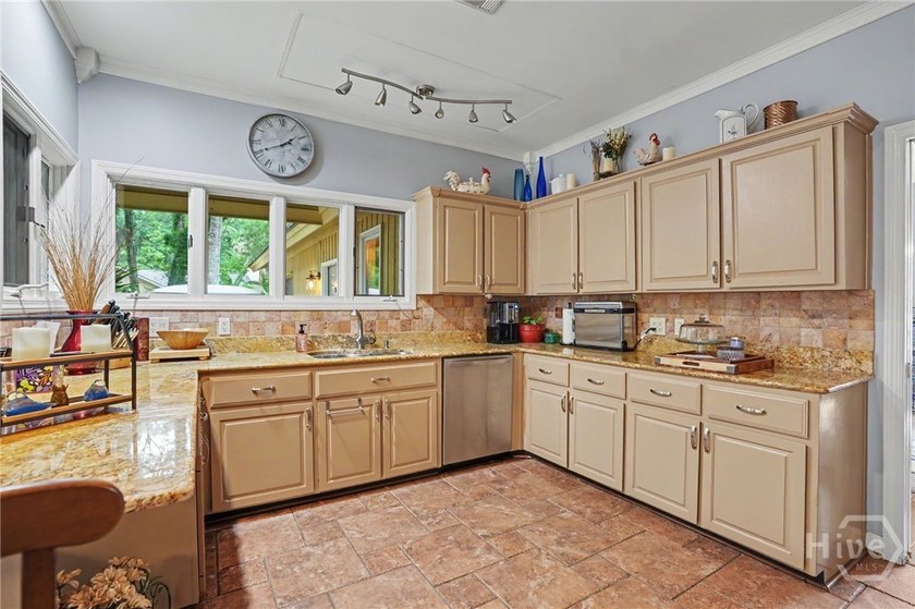 Located in the Marshwood section of The Landings, this - photo 8