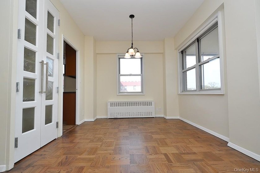 Perched on the top-floor corner, this sun-drenched 2-bedroom - photo 20