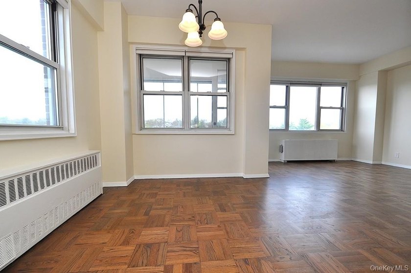 Perched on the top-floor corner, this sun-drenched 2-bedroom - photo 21