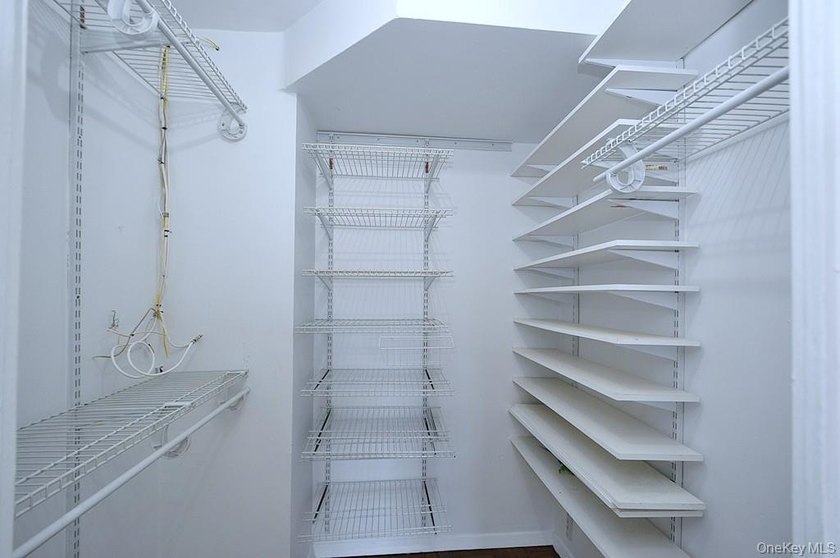 Perched on the top-floor corner, this sun-drenched 2-bedroom - photo 26