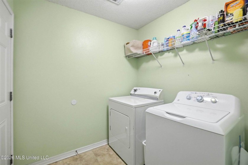 This beautiful brick home is located in a quiet subdivision with - photo 11