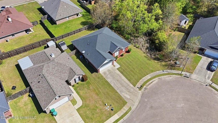 This beautiful brick home is located in a quiet subdivision with - photo 32