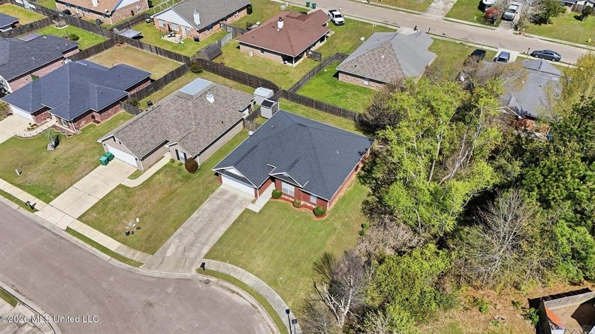 This beautiful brick home is located in a quiet subdivision with - photo 34