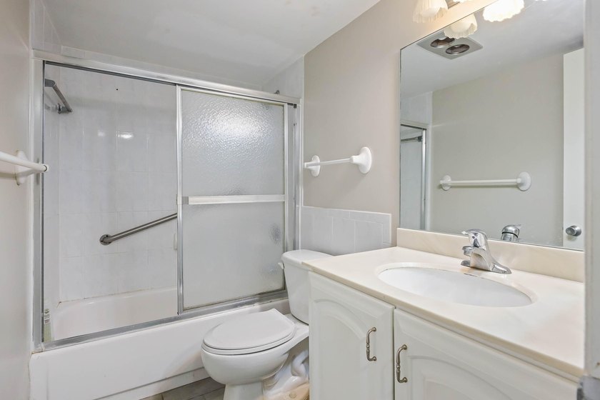 Beautiful 1-bedroom condo featuring updated flooring and a - photo 13