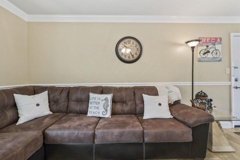 Experience easy coastal living in this beautifully updated - photo 11