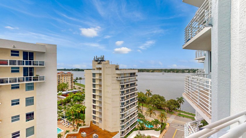 This 12th-floor unit in The Slade offers breathtaking views of - photo 14