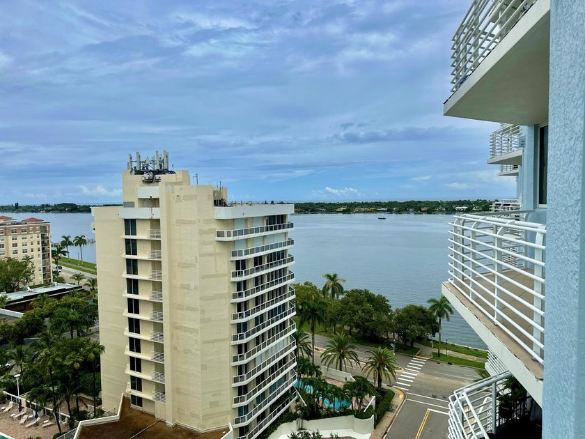 This 12th-floor unit in The Slade offers breathtaking views of - photo 16