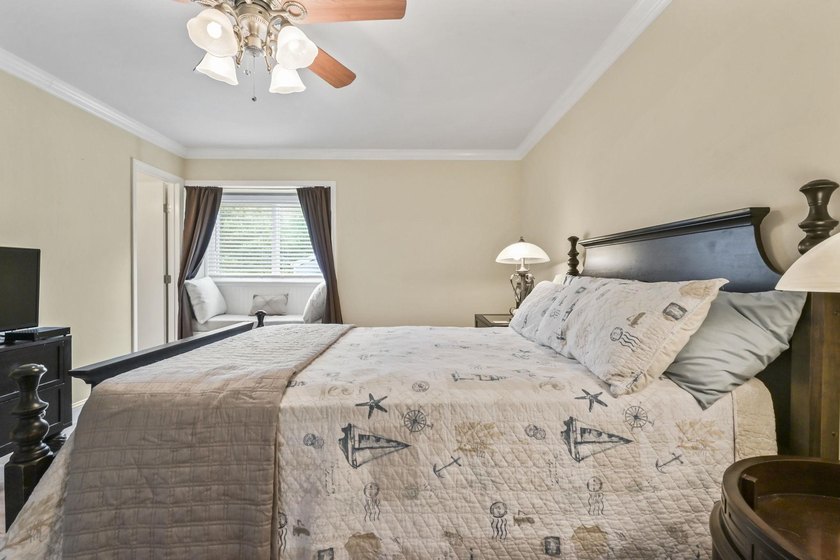 Experience easy coastal living in this beautifully updated - photo 20