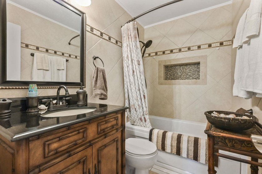Experience easy coastal living in this beautifully updated - photo 23