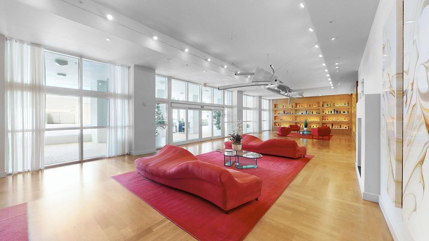 This 12th-floor unit in The Slade offers breathtaking views of - photo 24