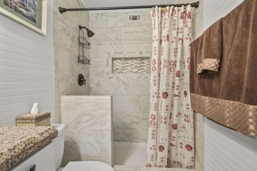 Experience easy coastal living in this beautifully updated - photo 34