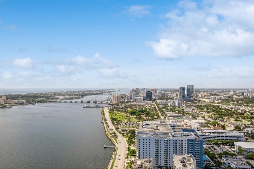 This 12th-floor unit in The Slade offers breathtaking views of - photo 35
