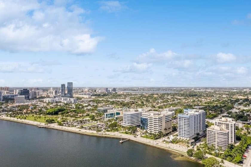 This 12th-floor unit in The Slade offers breathtaking views of - photo 36