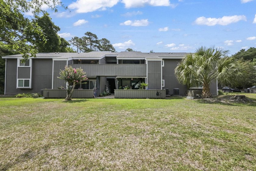 Experience easy coastal living in this beautifully updated - photo 44