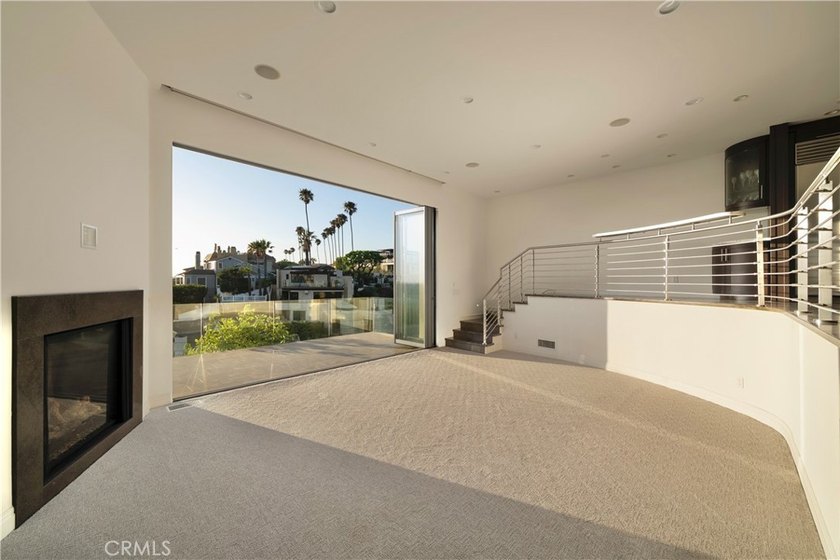 Perched on the coveted Corona del Mar bluff, this exceptional - photo 3