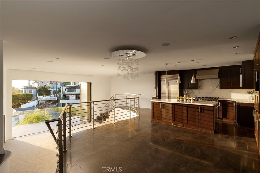 Perched on the coveted Corona del Mar bluff, this exceptional - photo 6