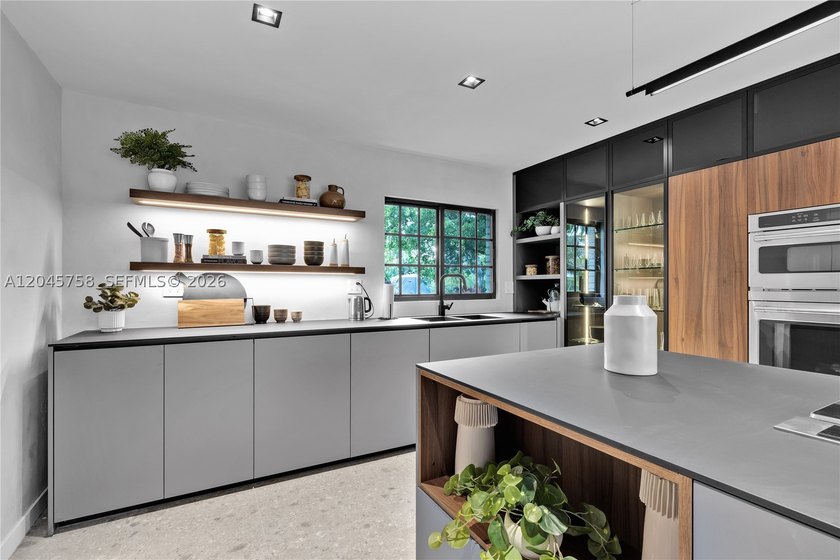 Featured on Netflix's Designing Miami, this fully renovated - photo 12