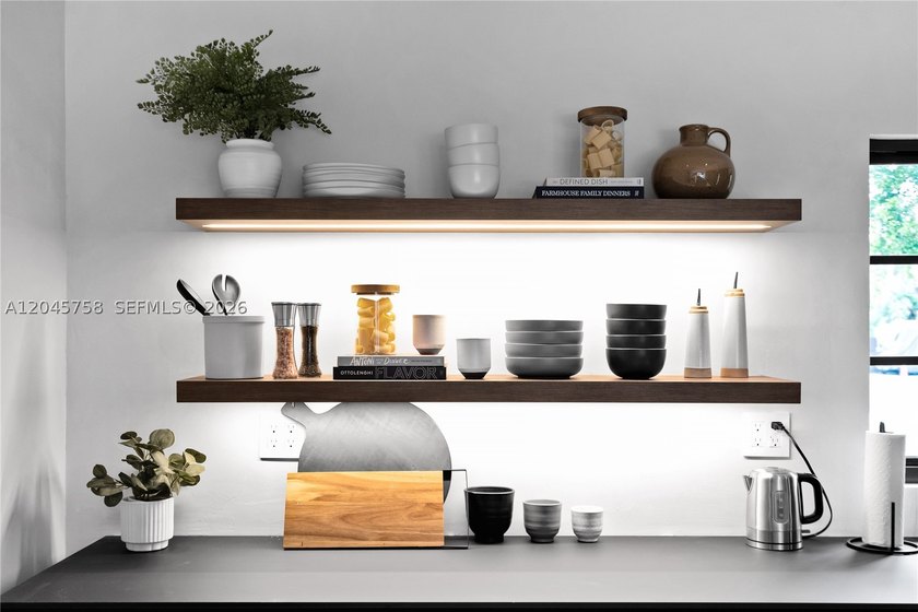 Featured on Netflix's Designing Miami, this fully renovated - photo 13