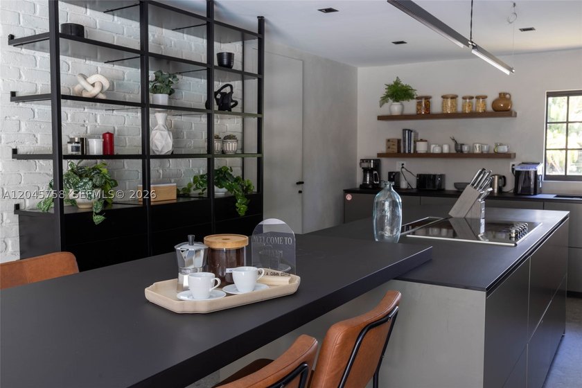 Featured on Netflix's Designing Miami, this fully renovated - photo 16