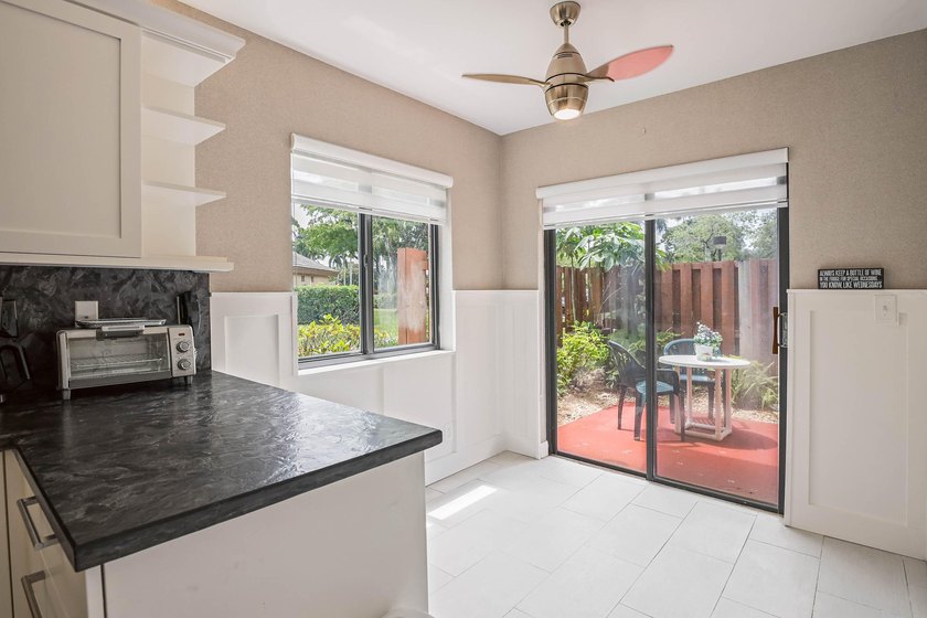 Updated 2-bedroom + den, 2-bathroom first-floor unit with golf - photo 16